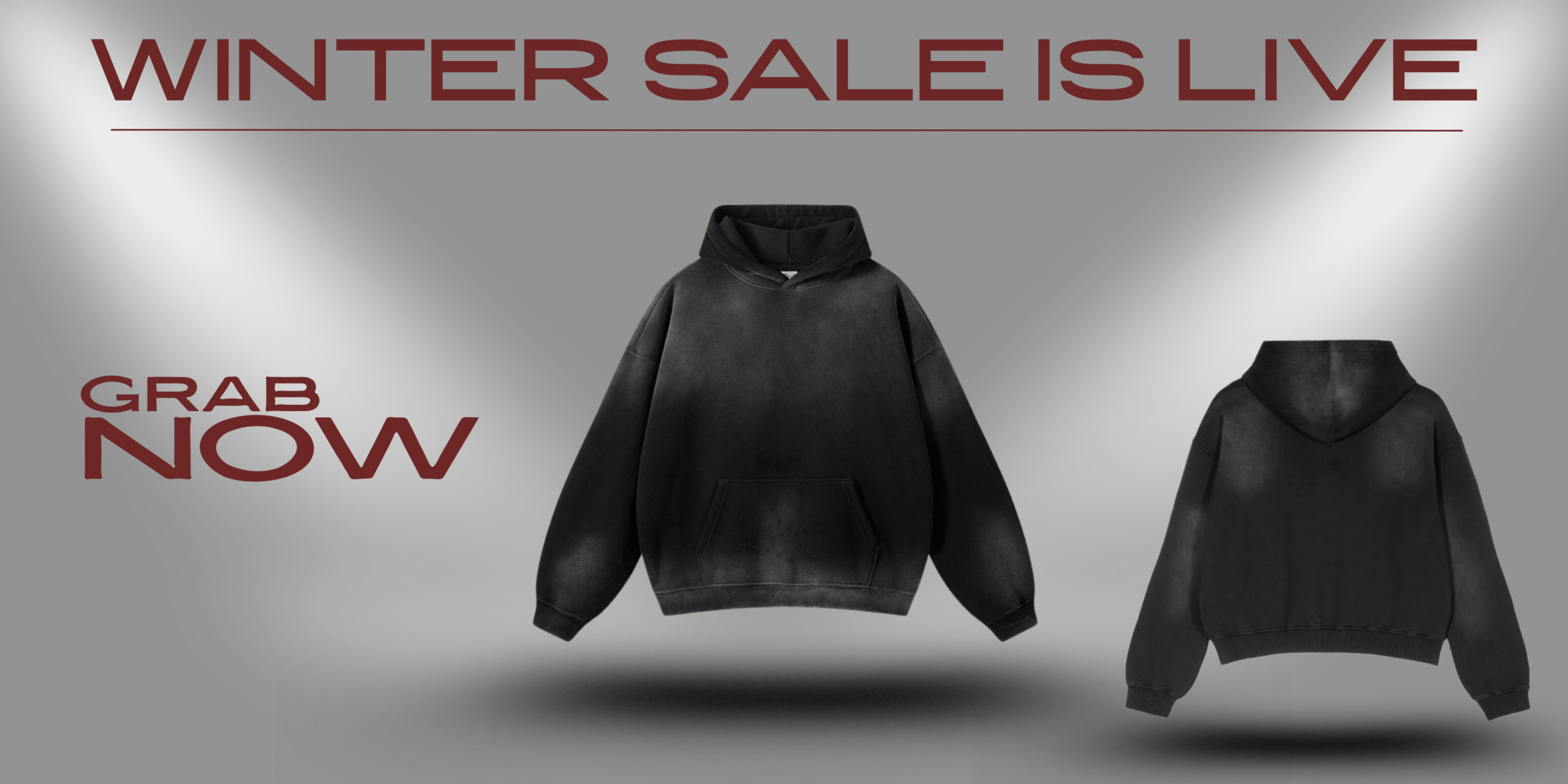 Black streetwear hoodie front and back displayed on a spotlighted grey background with “WINTER SALE IS LIVE” and “GRAB NOW” in bold red text.